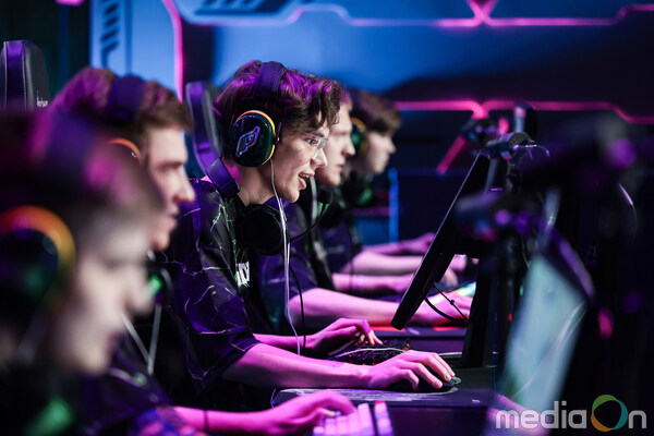 Phygital athletes competing against each other on the digital side of phygital